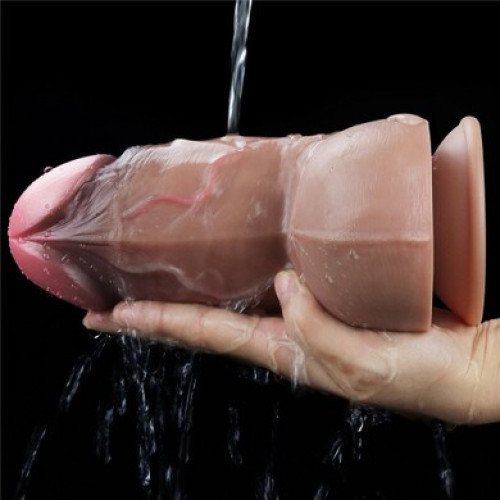 Толстый реалистичный фаллоимитатор-мулат на присоске с мошонкой Lovetoy Silicone Cock 18 см