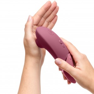 Бесконтактный вакуумно-волновой стимулятор клитора Womanizer Next темно-розовый (иной угол)