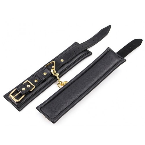 Черные поножи с золотистой цепочкой