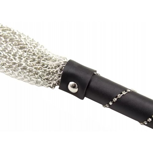 Металлическая плеть с декорированной рукоятью