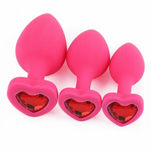 Розовая силиконовая пробка с кристаллом в форме сердца M красный (иной угол)